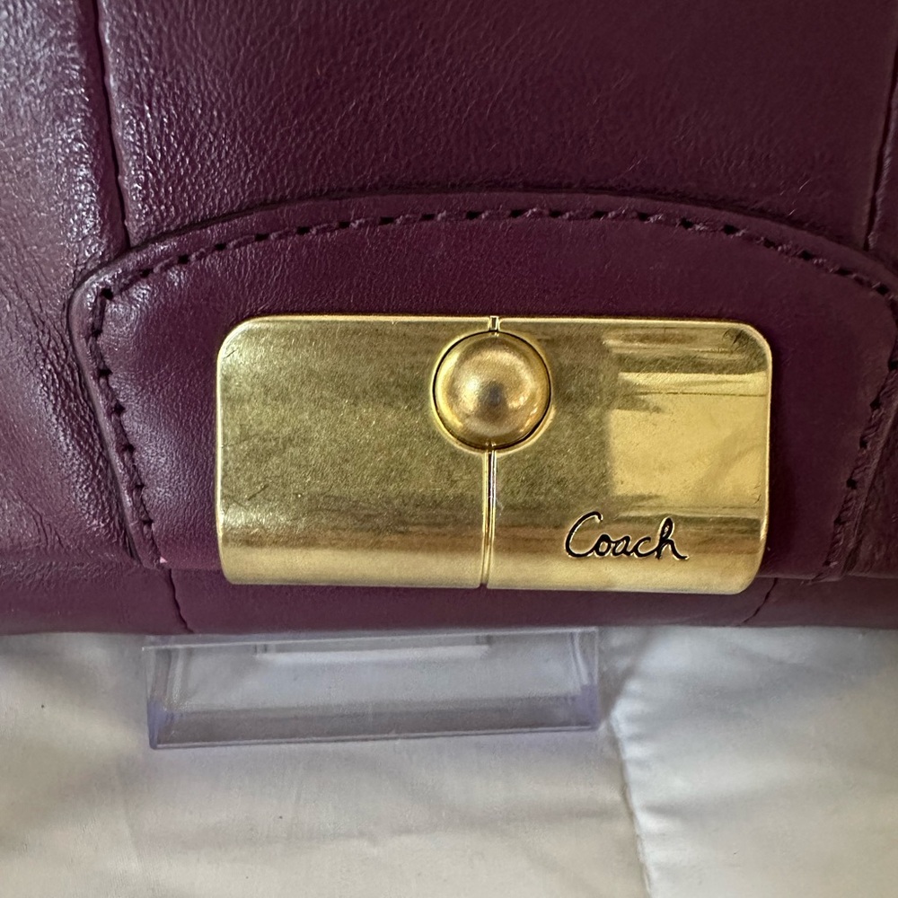 Coach Plum Leather Wristlet with Gold Accents - Picture 2 of 13